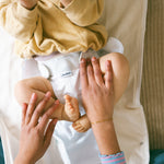 Baby gets a new cloth diaper from Judes - super easy.